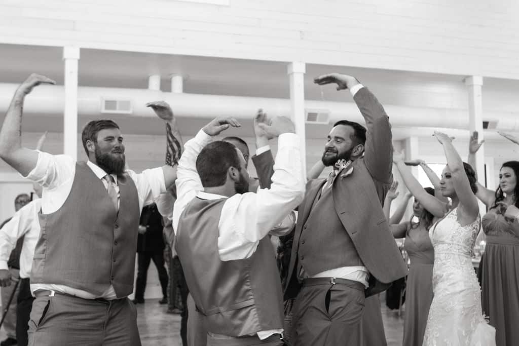 Picture of groomsmen at a wedding in Gastonia dancing to music by Sound Explosion wedding DJs